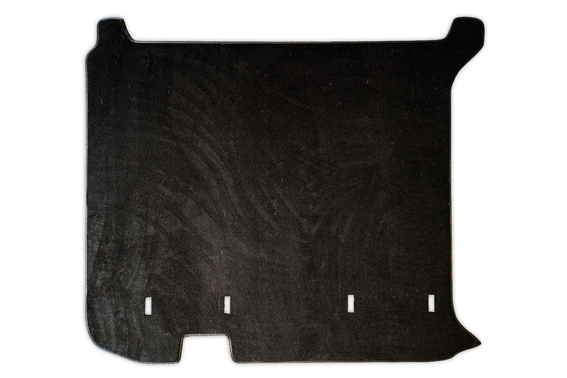 Mat to fit a T4 Multivan vehicle shown in black automotive carpet. 